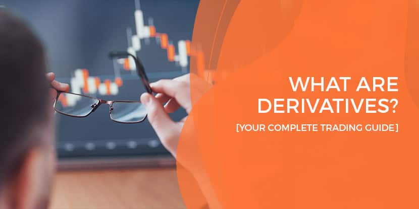 Trader analyzing derivatives market charts on multiple monitors showing futures contracts and price movements
